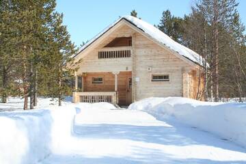 Фото номера Дом с 1 спальней и сауной Дома для отпуска Ounasloma Luxury Cottages г. Энонтекиё 2