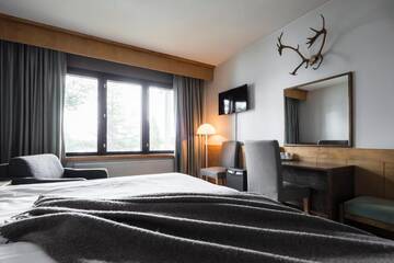 Фото номера Двухместный номер с 2 отдельными кроватями Отель Lapland Hotels Hetta г. Энонтекиё 6